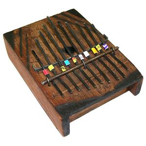 Kalimba (wooden percussion sound box with metal keys)