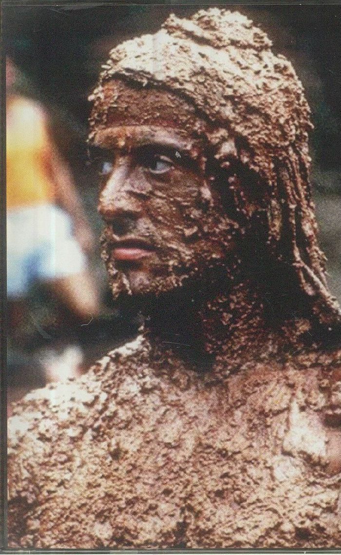 SUNBURNED HAND OF THE MAN - Covered In Mud