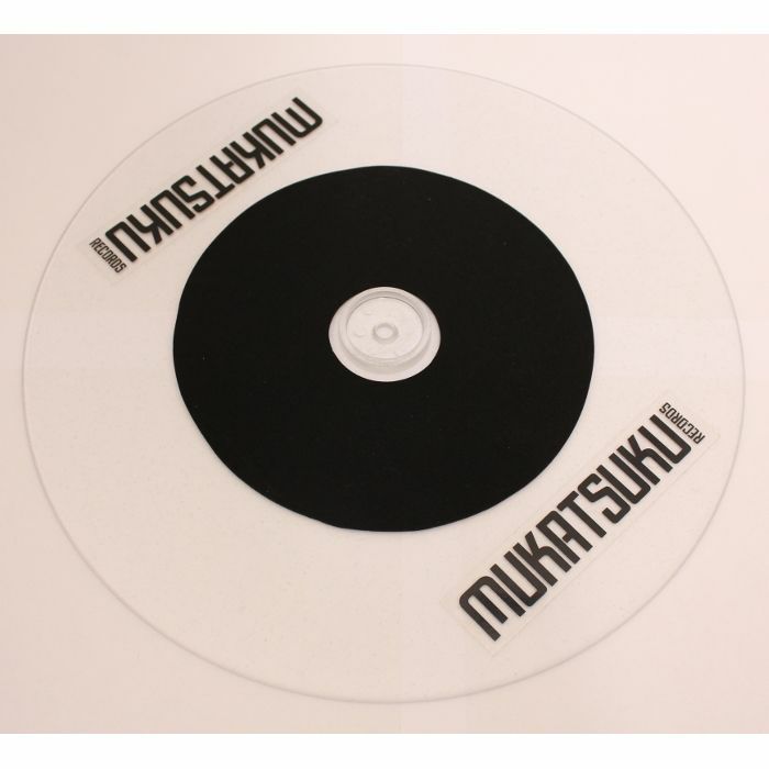 MUKATSUKU - Mukatsuku Records DJ 45 Twister Plastic 7" Slipmat (single) (frosted clear with Mukatsuku logo sticker + charity shop 45) (Juno Exclusive)