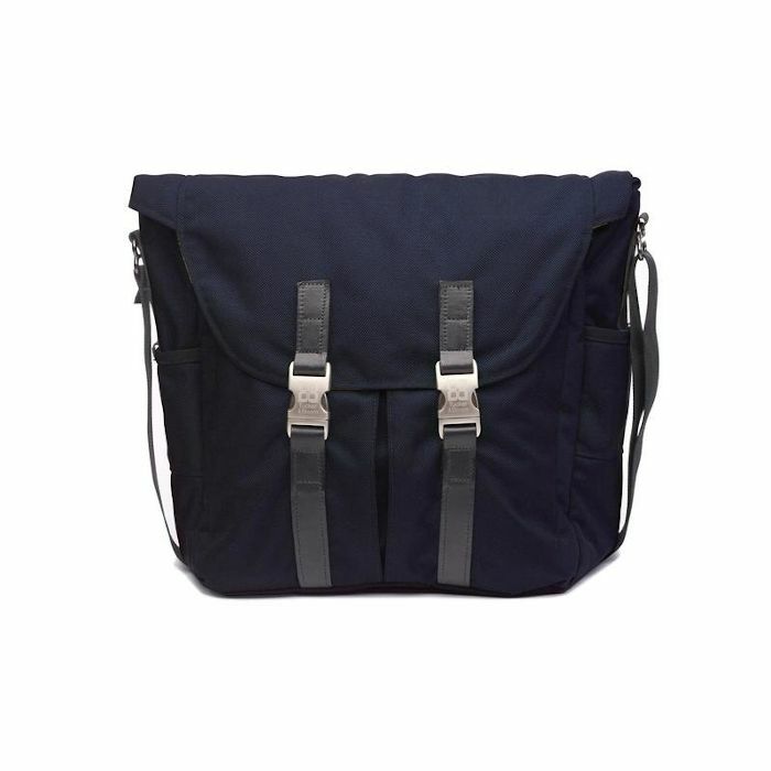 TUCKER & BLOOM - Tucker & Bloom North To South 12" Vinyl Messenger Bag With Leather Trim (navy blue with orange interior)